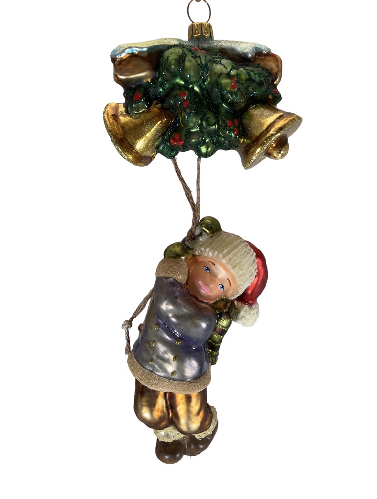 boy under bells