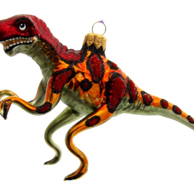 Een t-rex als kerst decoratie wie had dat gedacht, je kerstboom als reflextie vanhet speelgoed van je kinderen. kerst, kerstmis, kerstman, kerstboom, dier, historie, natuur,