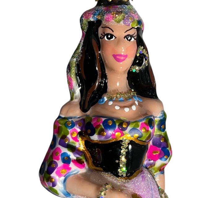 Our gipsy girl as a christmas ornament, a free lady eager to dance to your christmas tree as a statement of freedom.