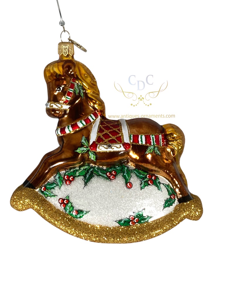 A rocking horse, our childhood memories, ohh how i loved mine. I know it got lost when my parents moved but I will always cherish it in my heart.