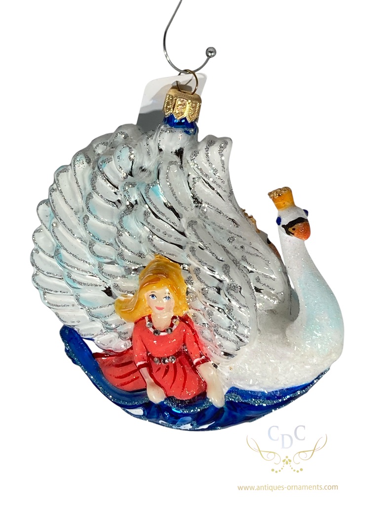 Elisa with her enchanted brothers, during daytime swans during night princes. A Fairytale for all may into a christmasonrament : a lesson in siblings love.