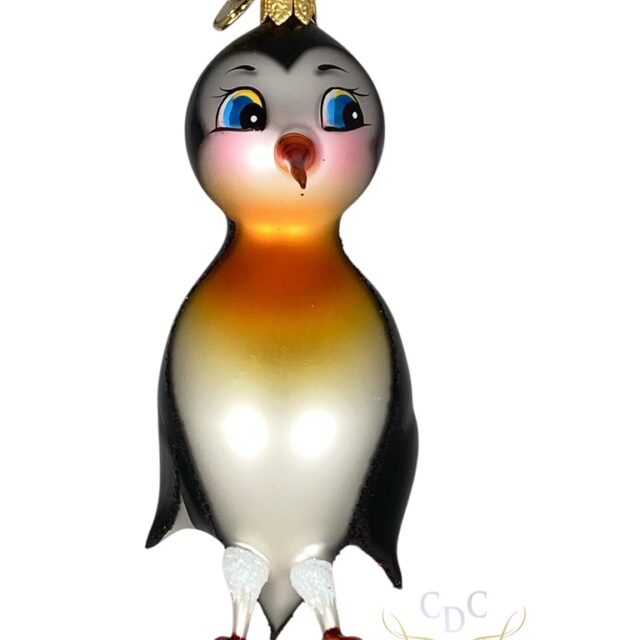 Wandelende pinguin, hij is klaar om op stap te gaan. Deze kerstdecoratie is vrij geblazen en kan daarom steeds een beetje van formaat verschillen